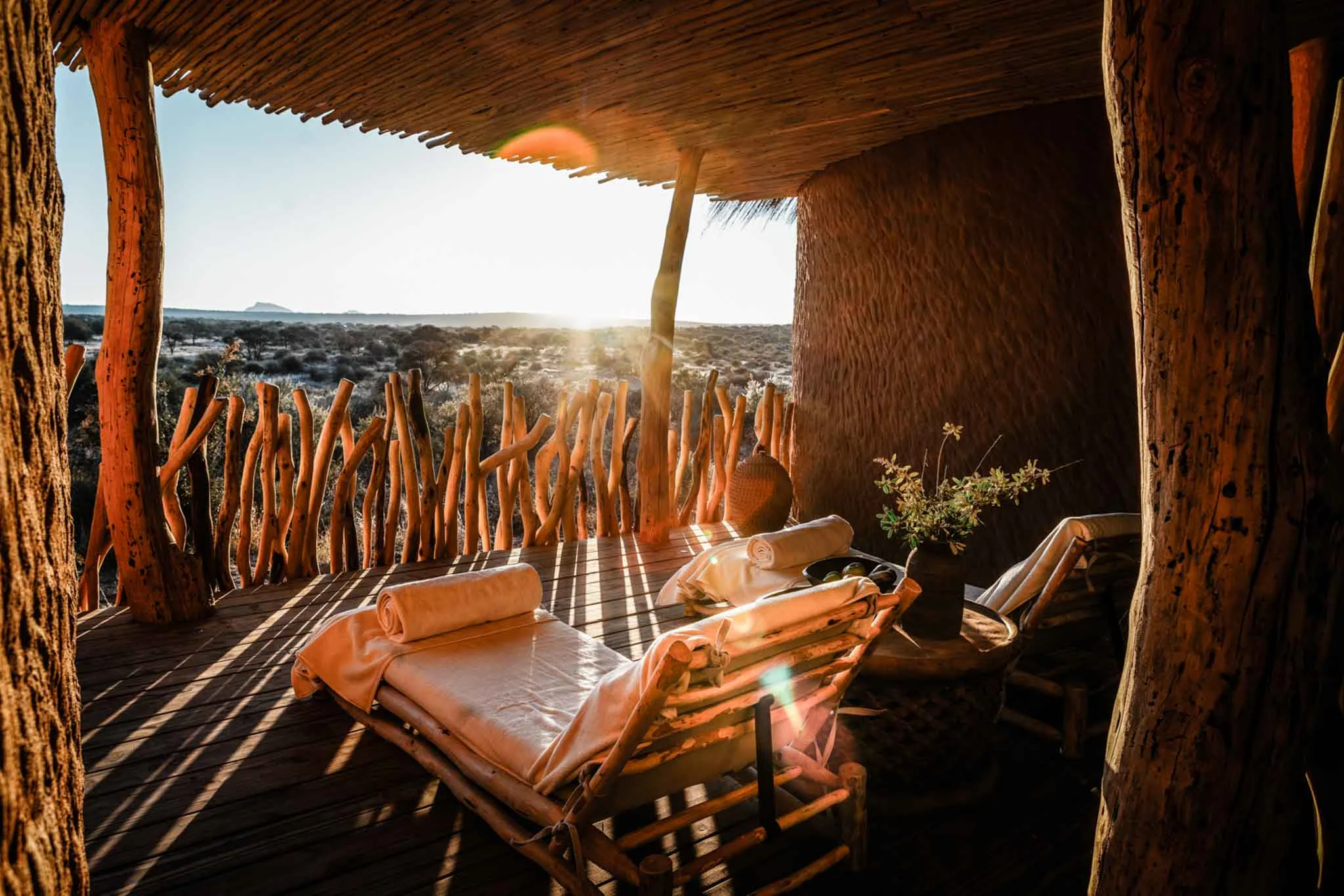 Zannier Omaanda, Namibia - Relaxing area of the spa, overlooking the sunny savannah at golden hour.