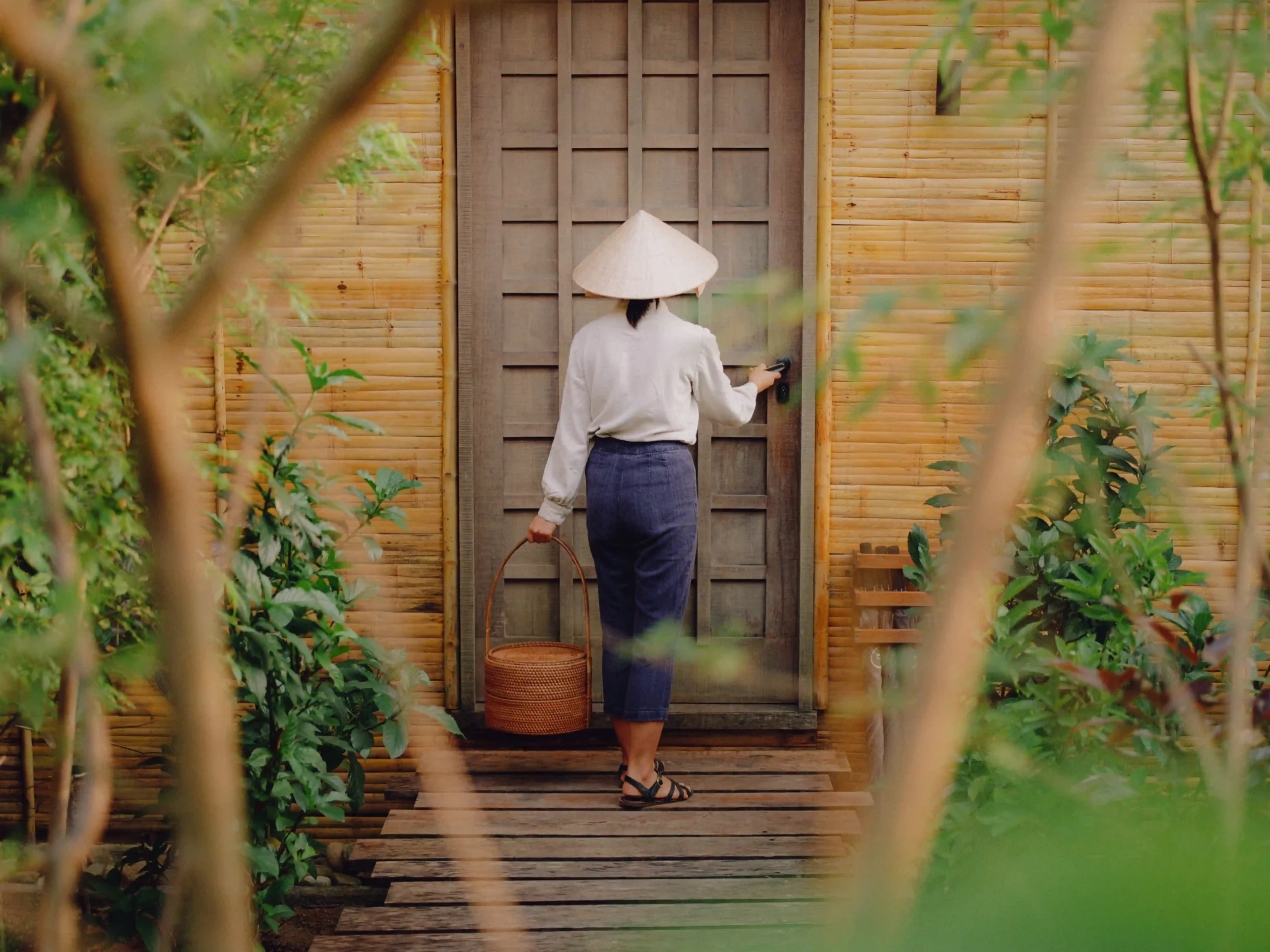 Zannier Bãi San Hô, Dak Lak, Vietnam - Guest Assistant delivering room service in a Hill Pool Villa.