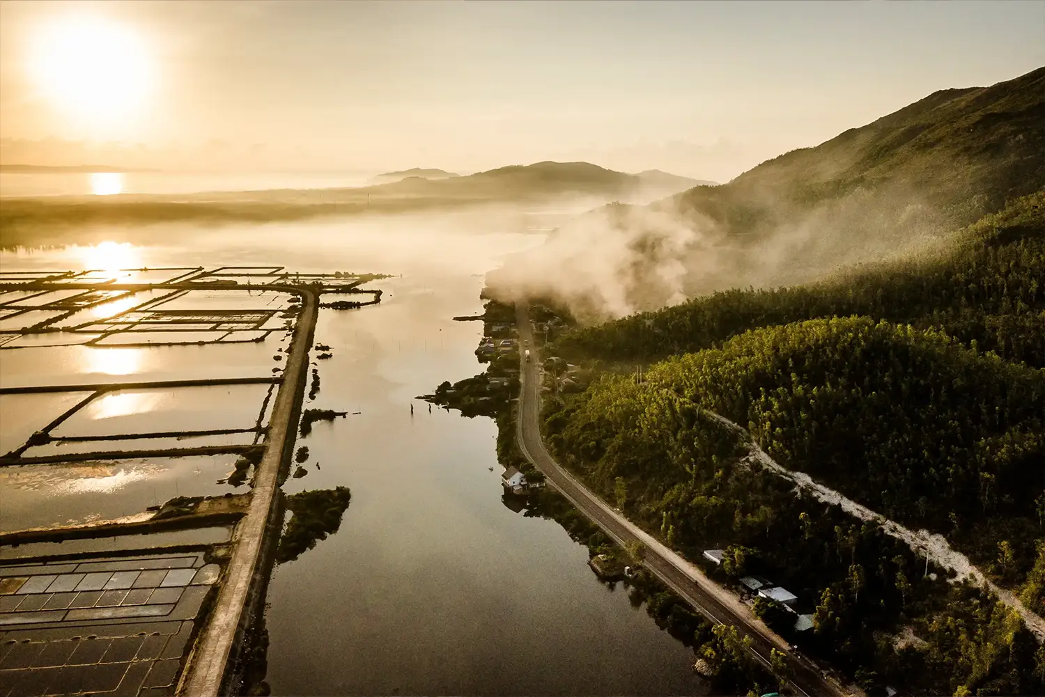 Zannir Bãi San Hô, Dak Lak, Vietnam - An aerial view at sunrise of the area surrounding the resort, featuring the salt marshes