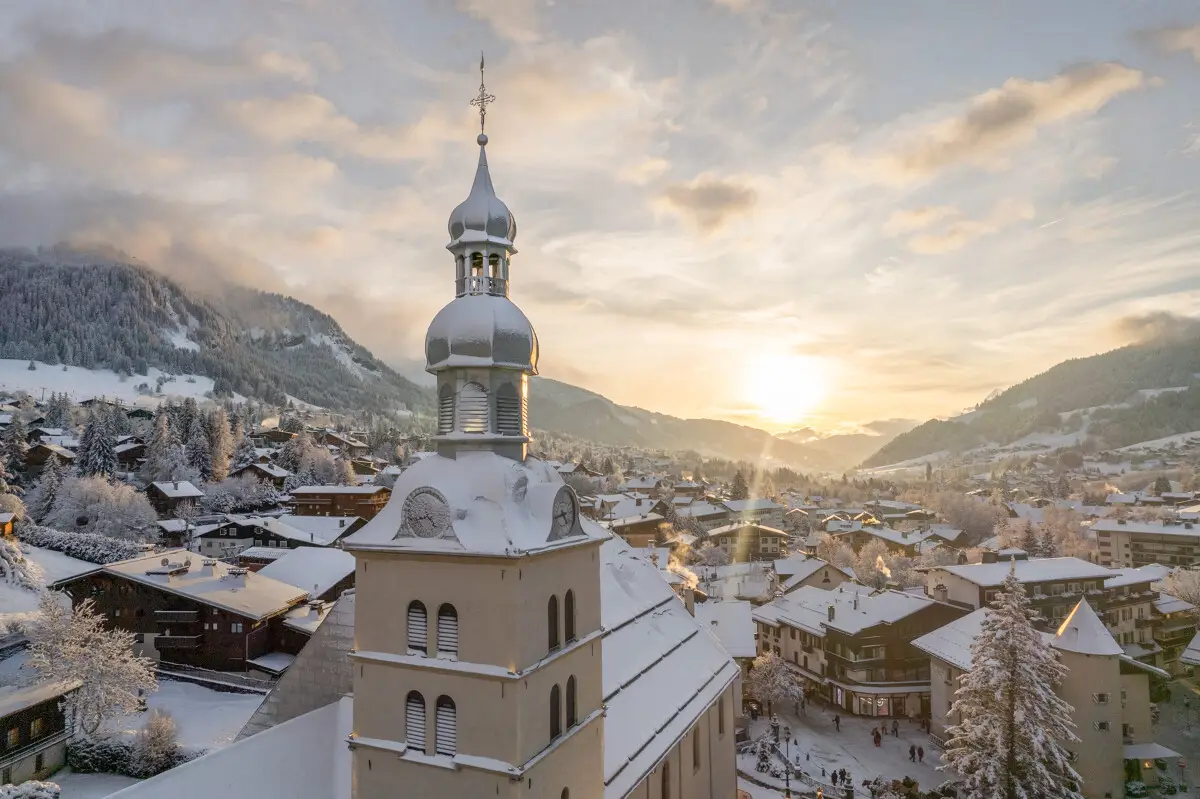Megève, France - Overview of the mountainous city at sunset